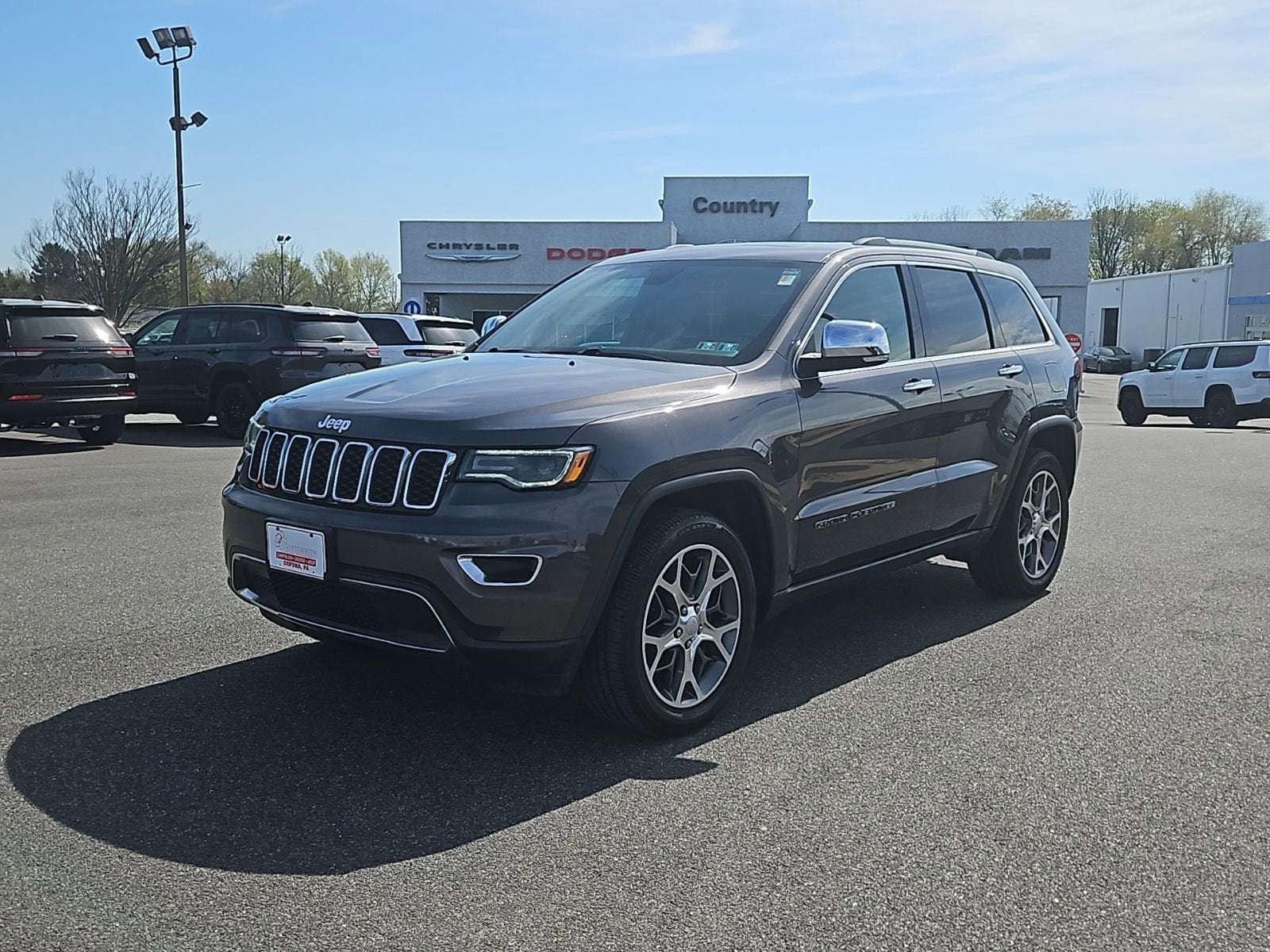 2020 Jeep Grand Cherokee Limited in Granite — front three-quarter view