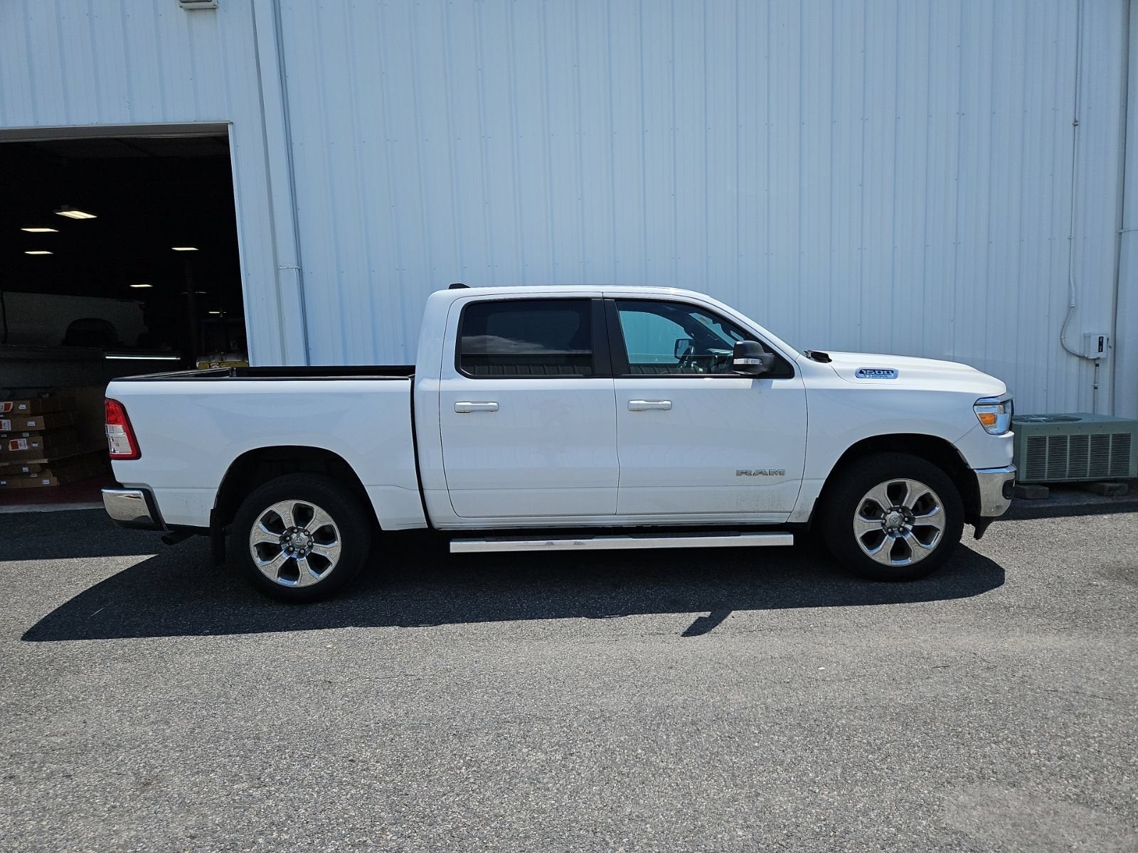 2022 RAM 1500 Big Horn in White — front three-quarter view