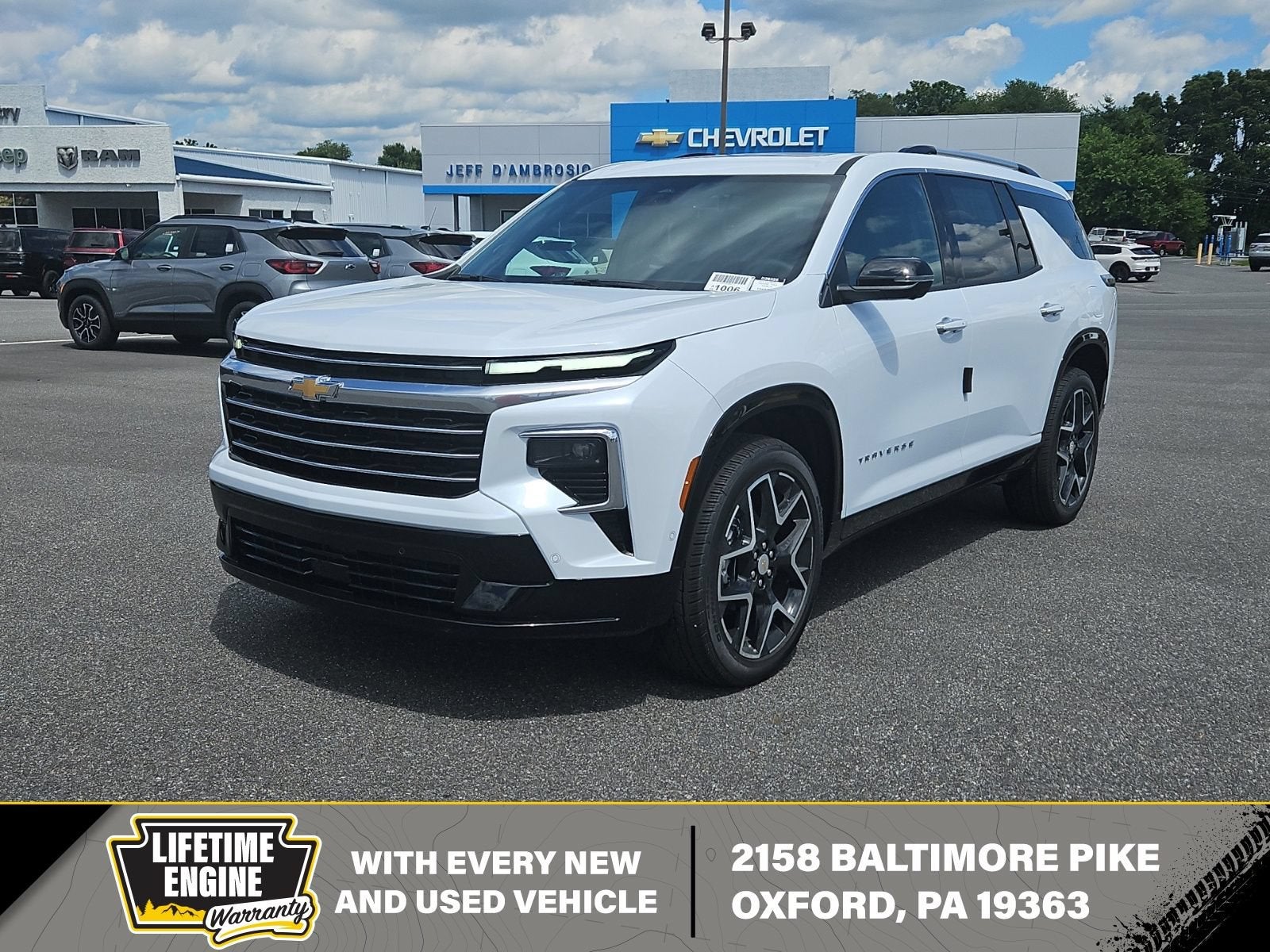 2026 Chevrolet Traverse High Country in Polar White Tricoat — front three-quarter view