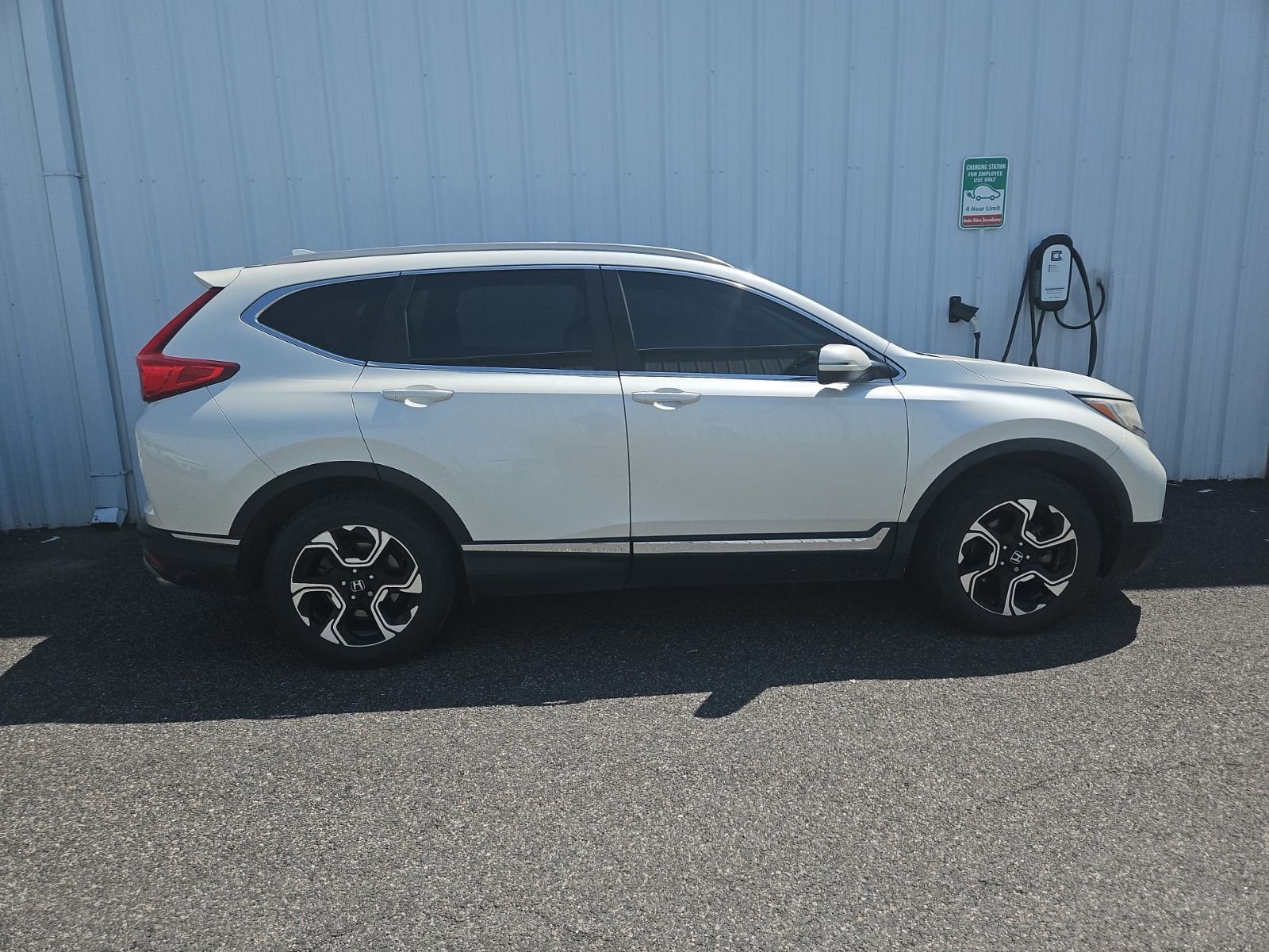 2018 Honda CR-V Touring in White — front three-quarter view