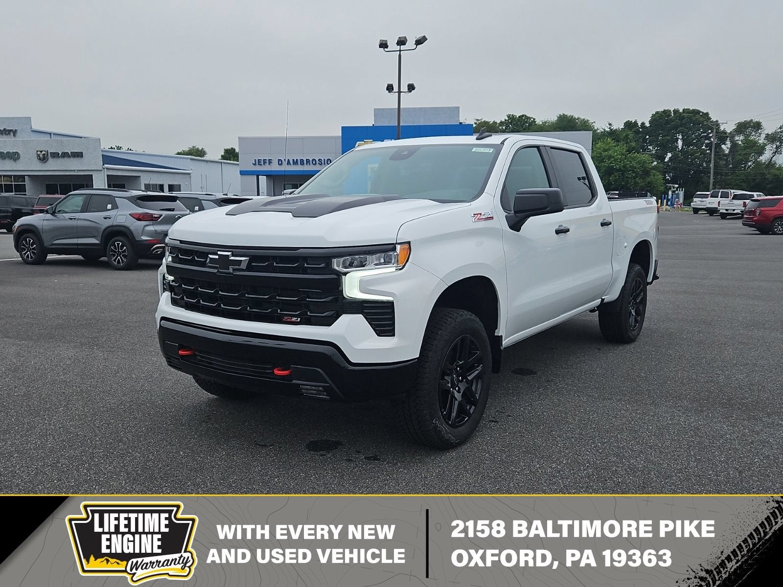 2026 Chevrolet Silverado 1500 LT Trail Boss in Summit White — front three-quarter view