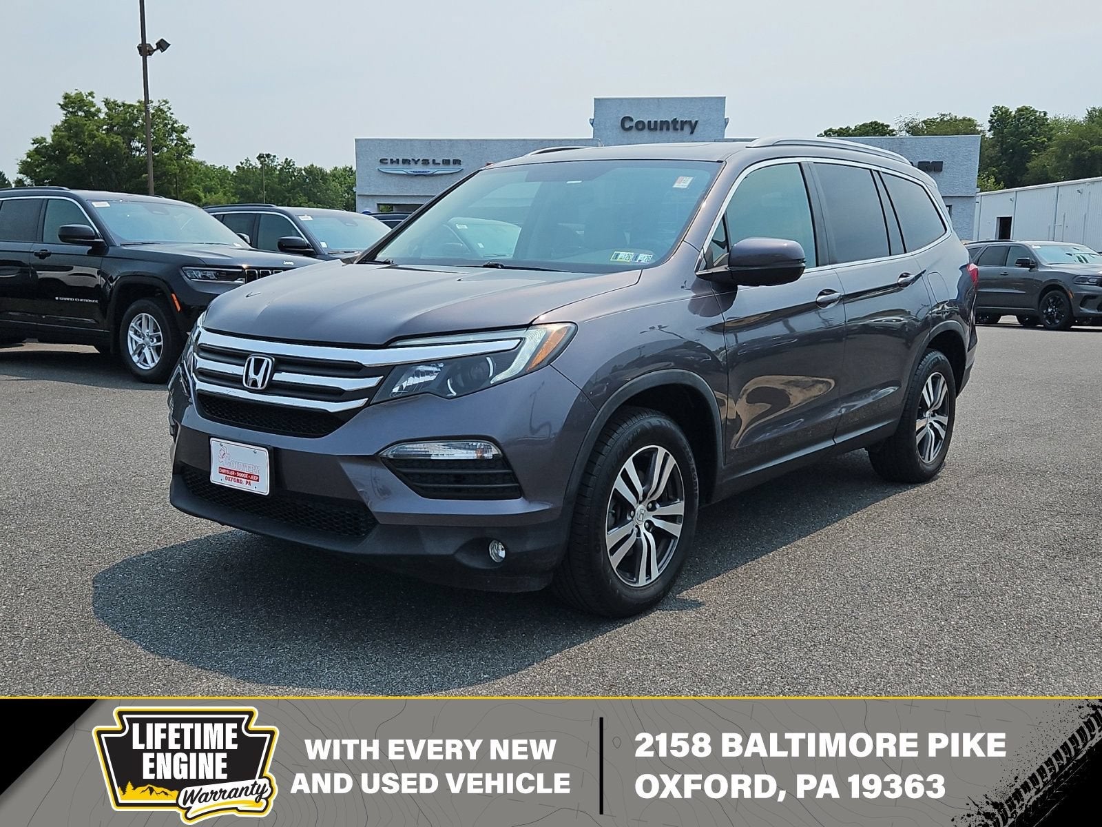 2017 Honda Pilot EX-L in Charcoal — front three-quarter view