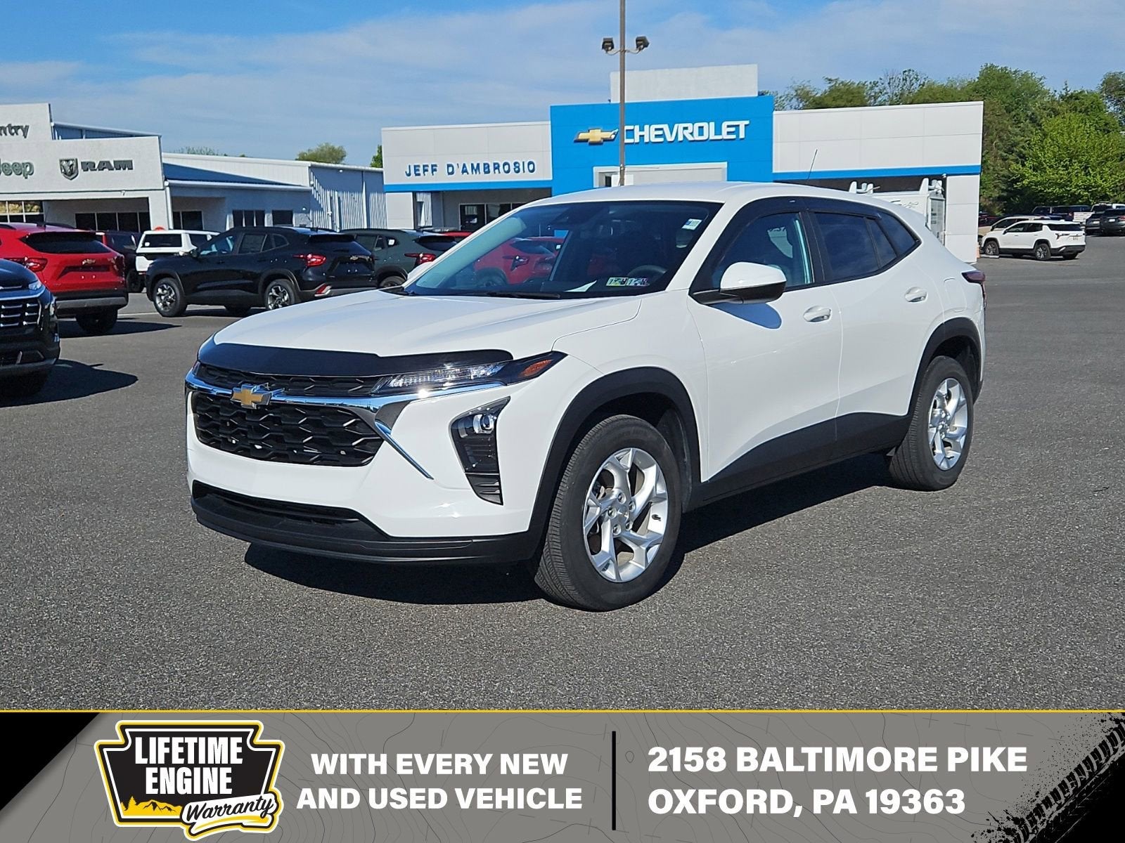 2024 Chevrolet Trax LS in Summit White — front three-quarter view